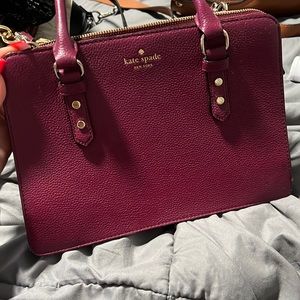 Good condition purple/maroon Kate spade  purse